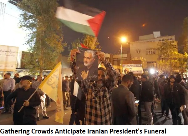 Gathering Crowds Anticipate Iranian President’s Funeral