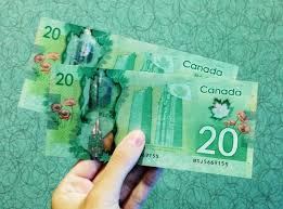Canadian Dollar and US Dollar Slide Following Disappointing Manufacturing PMI Reports